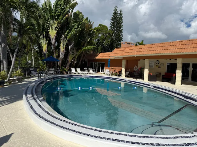 a view of outdoor space with swimming pool and patio
