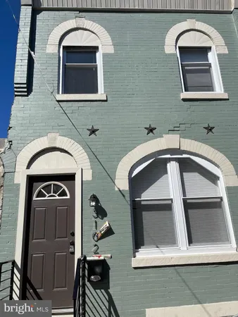 a front view of a house with windows