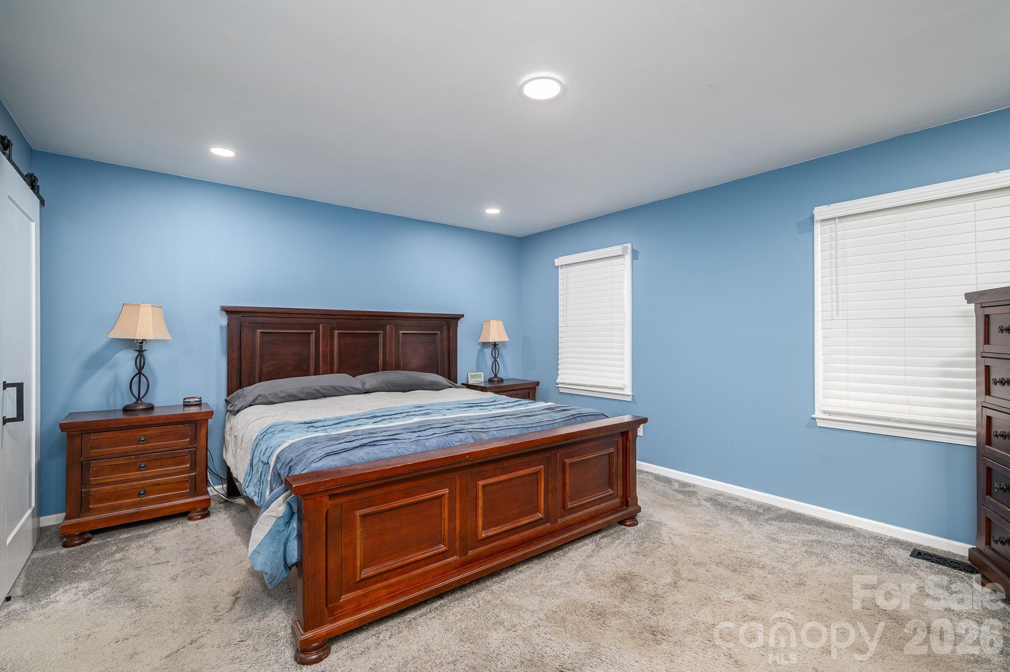 112 Pilots Ridge Drive Bessemer City, NC 28016 - Photo 12 of 36 a bedroom with a bed and a window