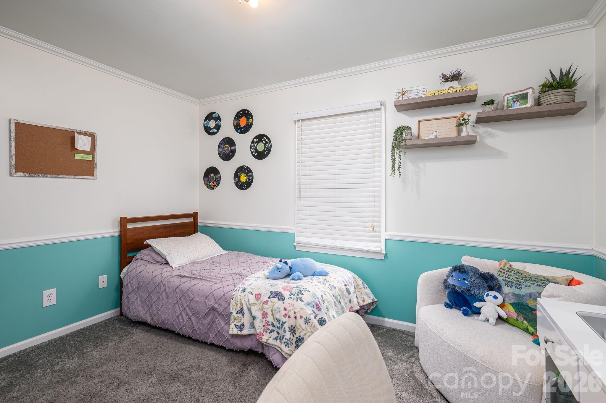 112 Pilots Ridge Drive Bessemer City, NC 28016 - Photo 16 of 36 a bedroom with two beds and a couch