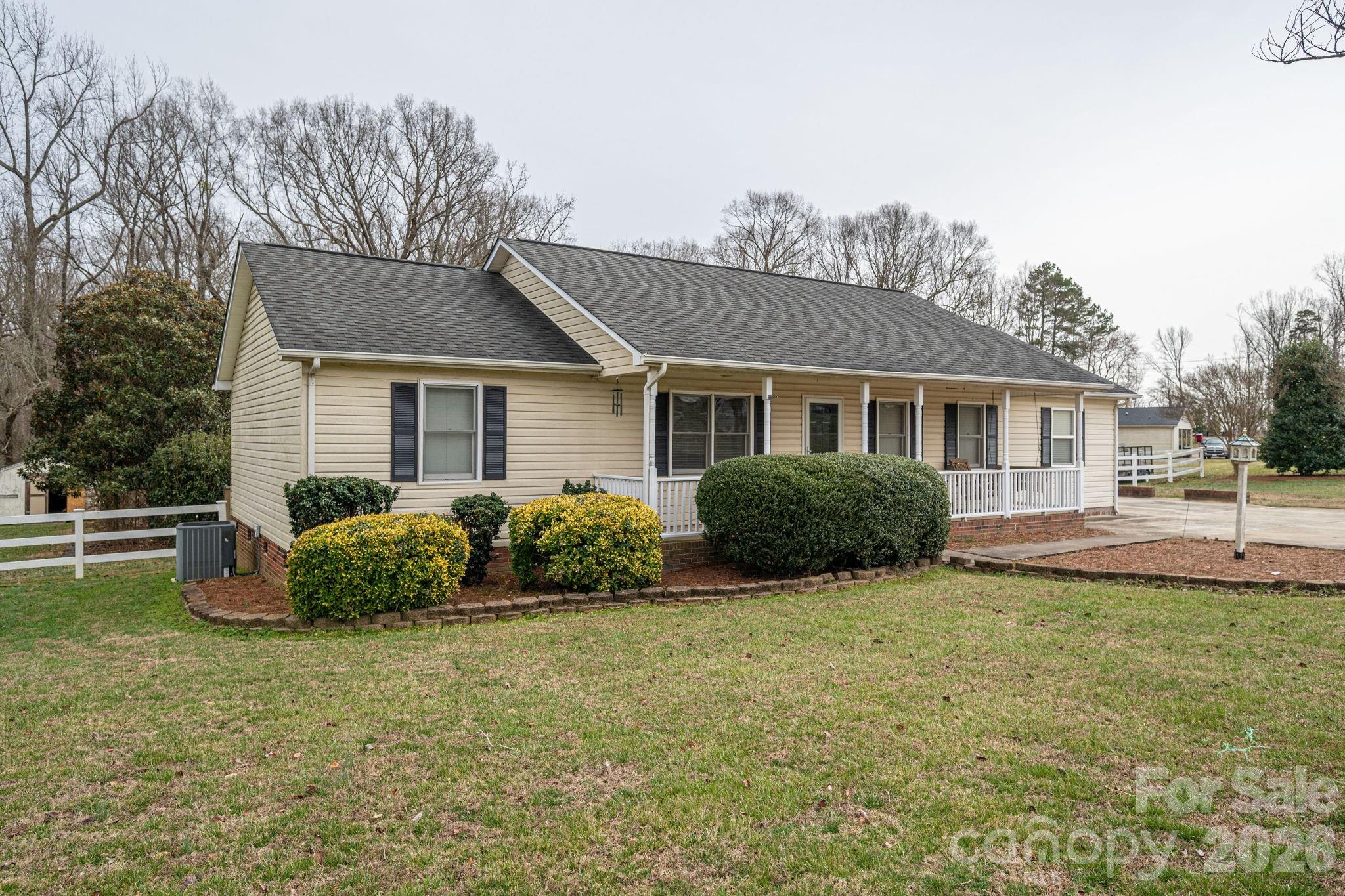 112 Pilots Ridge Drive Bessemer City, NC 28016 - Photo 2 of 36 a view of a house with backyard and porch