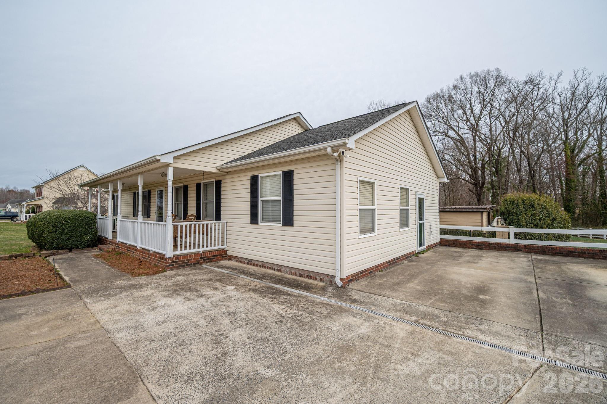 112 Pilots Ridge Drive Bessemer City, NC 28016 - Photo 3 of 36 a view of house with a yard