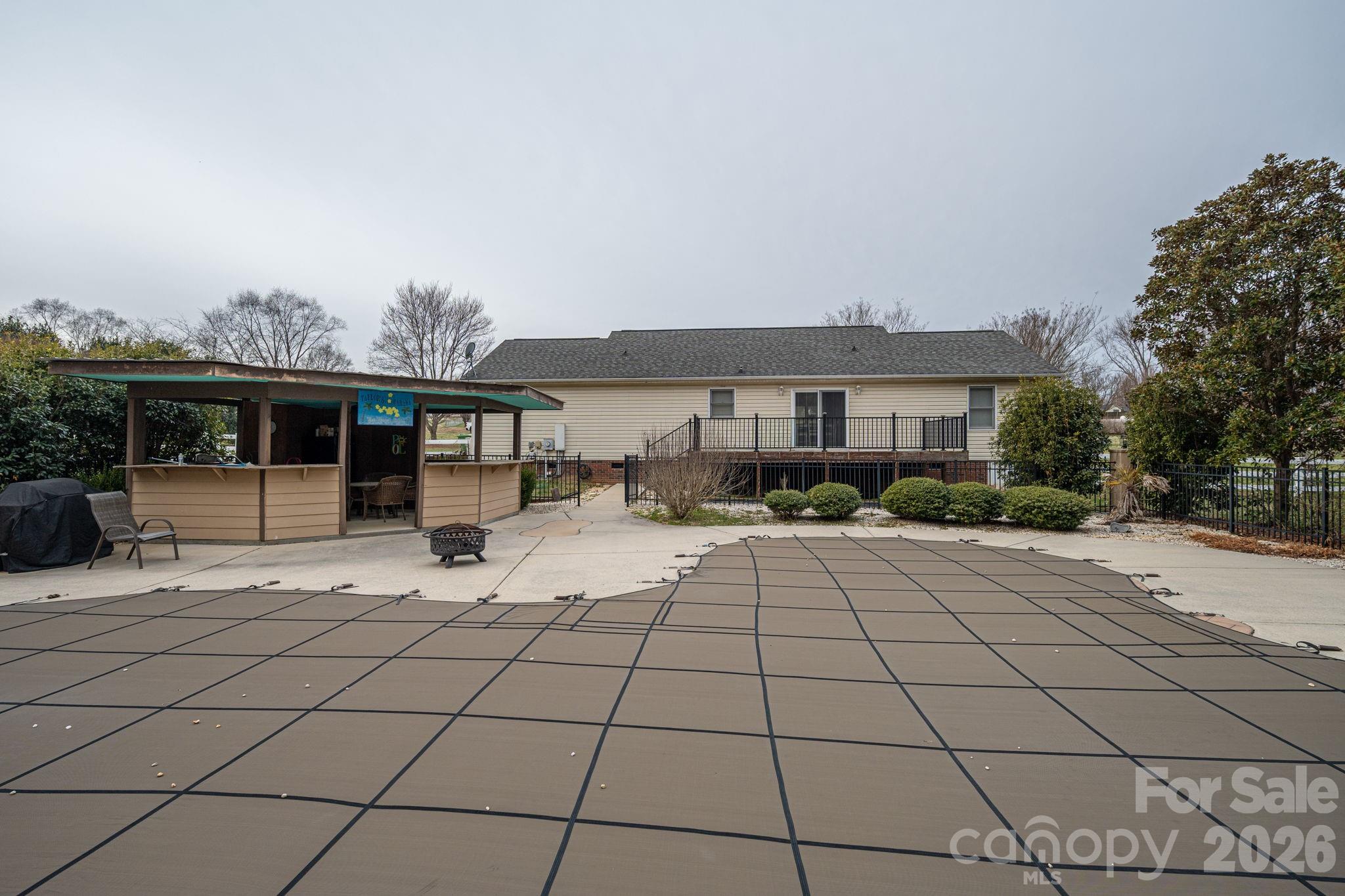 112 Pilots Ridge Drive Bessemer City, NC 28016 - Photo 31 of 36 a front view of house with yard outdoor seating and barbeque oven