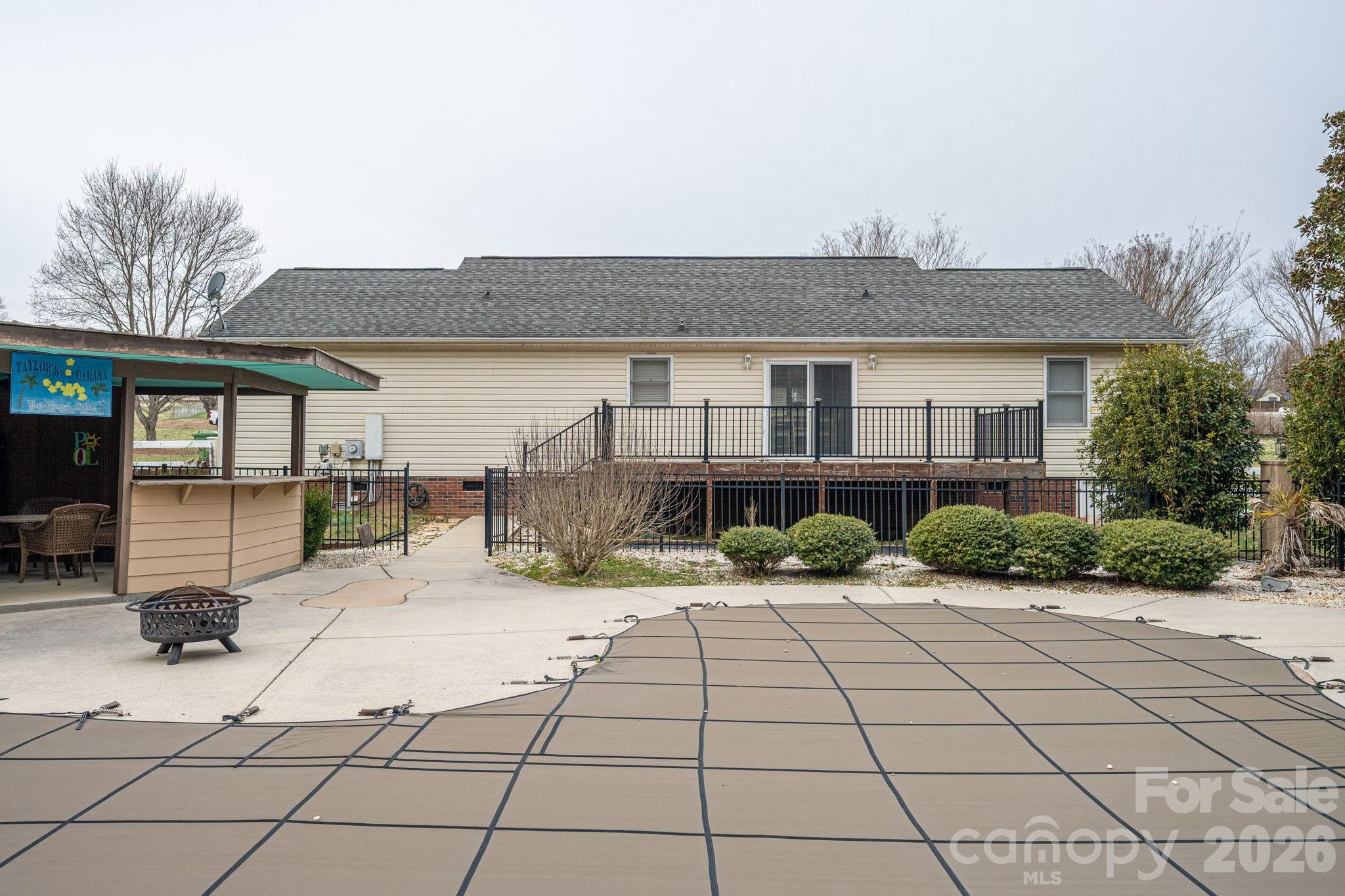 112 Pilots Ridge Drive Bessemer City, NC 28016 - Photo 32 of 36 a view of a house with backyard and sitting area