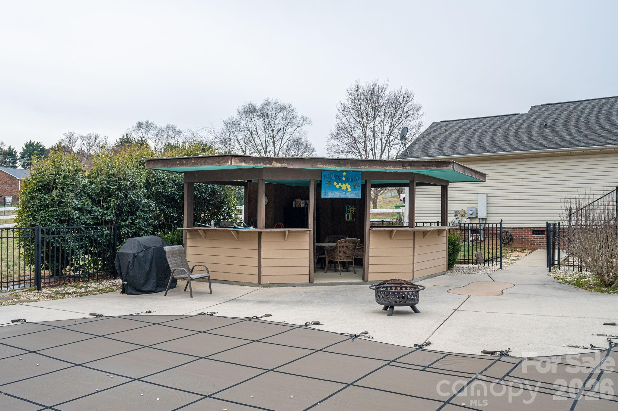 112 Pilots Ridge Drive Bessemer City, NC 28016 - Photo 33 of 36 a view of a lounge chairs in the patio