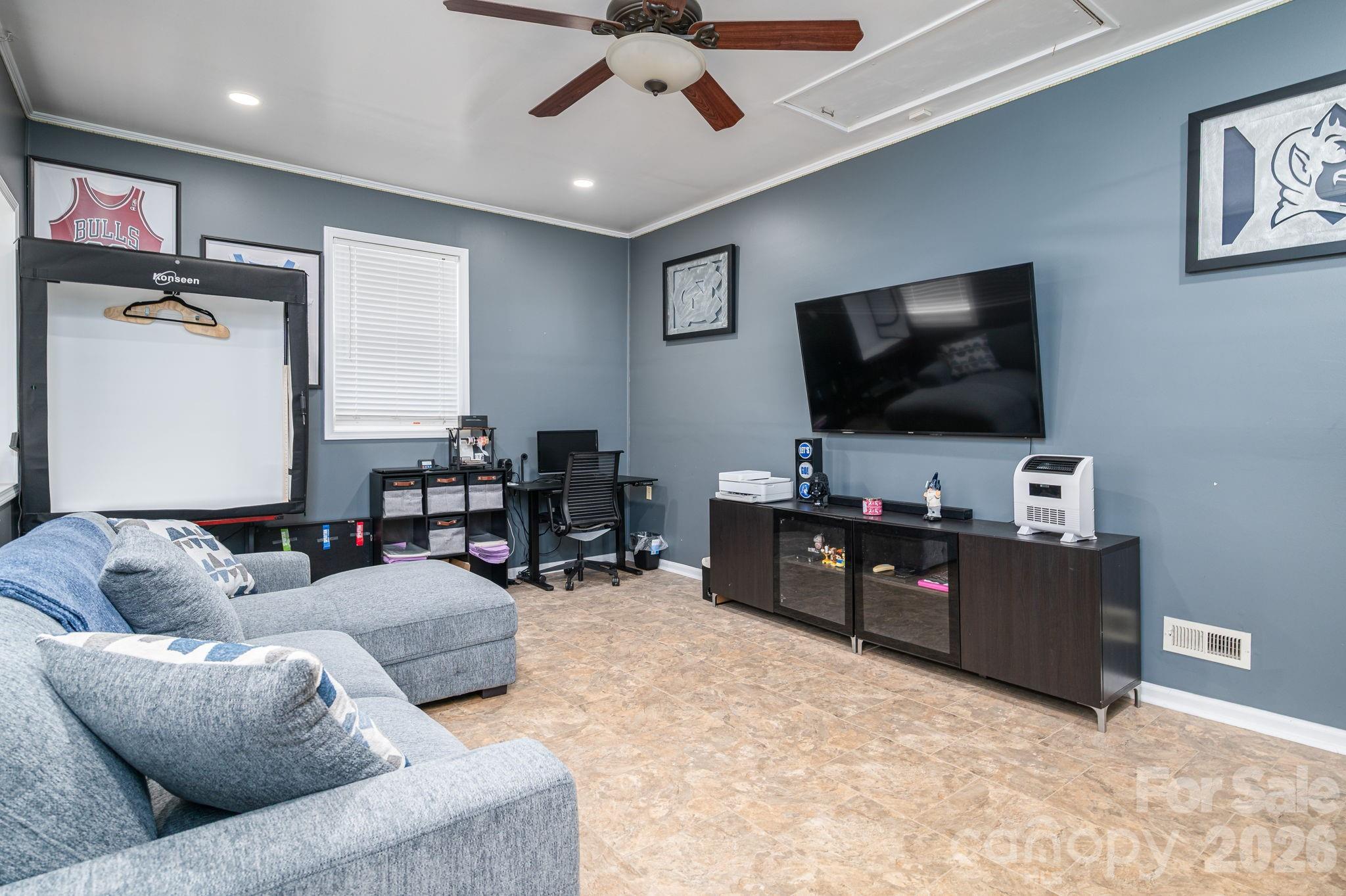 112 Pilots Ridge Drive Bessemer City, NC 28016 - Photo 6 of 36 a living room with furniture and a flat screen tv