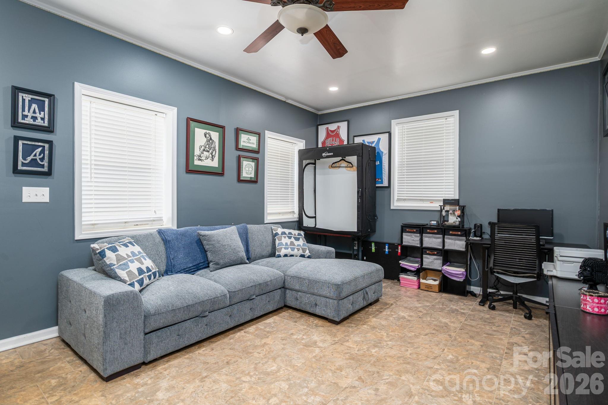 112 Pilots Ridge Drive Bessemer City, NC 28016 - Photo 7 of 36 a living room with furniture and a window