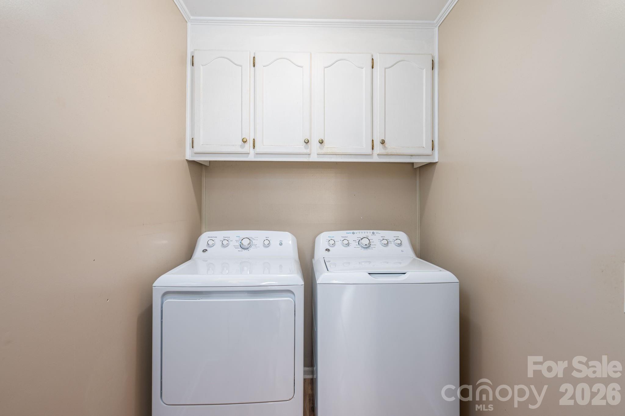 112 Pilots Ridge Drive Bessemer City, NC 28016 - Photo 9 of 36 a utility room with dryer and washer