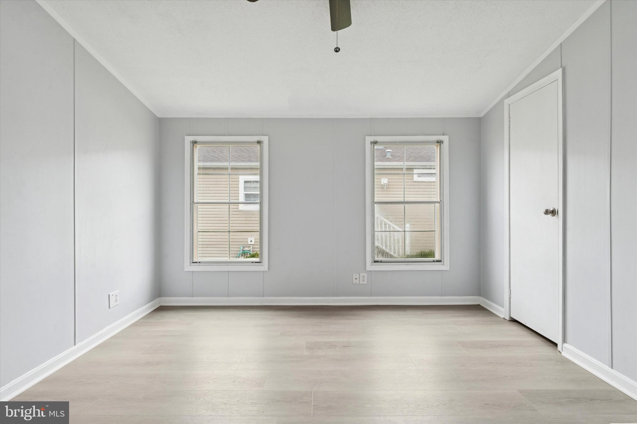 1920 Brian Circle, Unit 650 Bear, DE 19701 - Photo 15 of 25 an empty room with windows