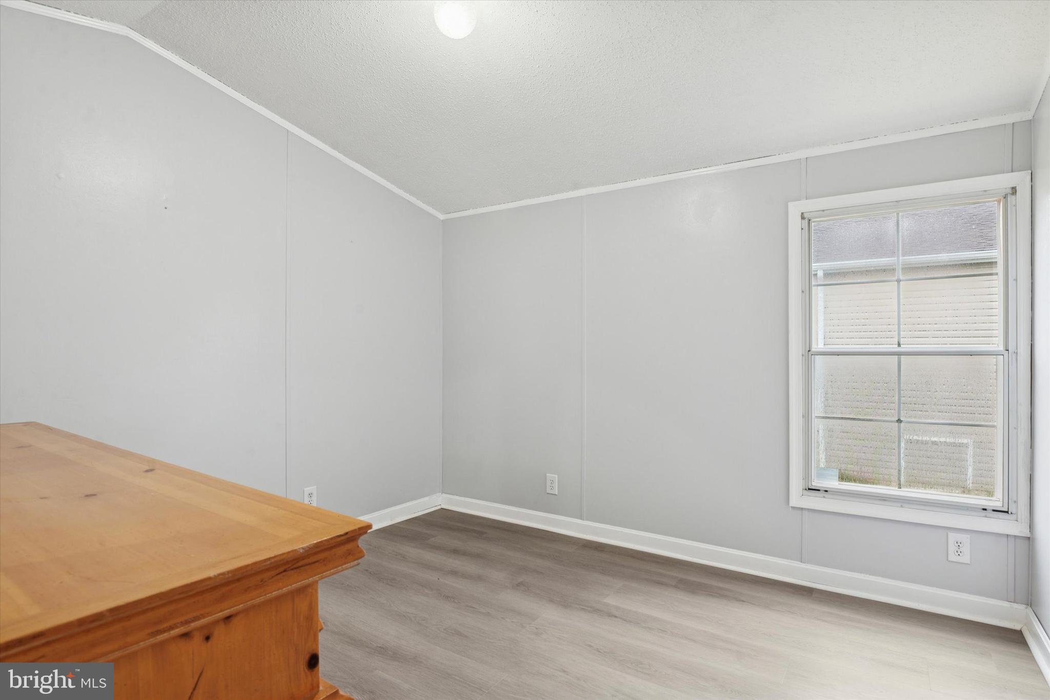 1920 Brian Circle, Unit 650 Bear, DE 19701 - Photo 17 of 25 an empty room with a window