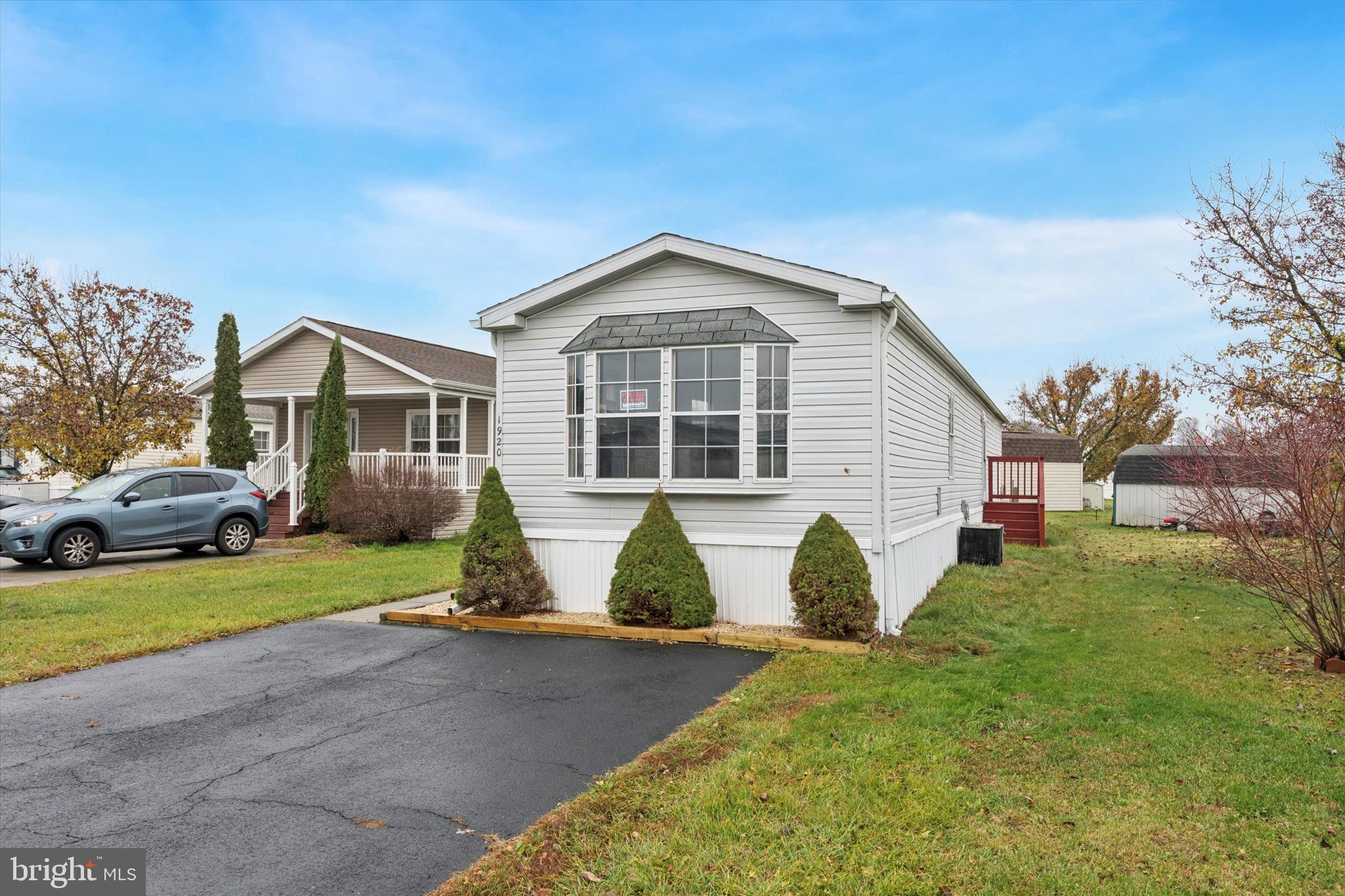 1920 Brian Circle, Unit 650 Bear, DE 19701 - Photo 2 of 25 a view of a house with a yard