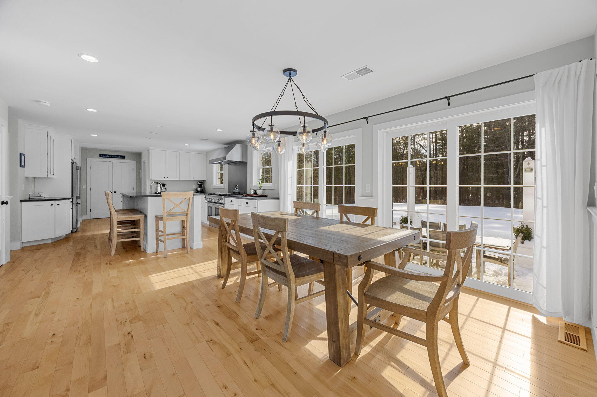 174 Cross Neck Road Marion, MA 02738 - Photo 7 of 41 a view of a dining room with furniture window and outside view