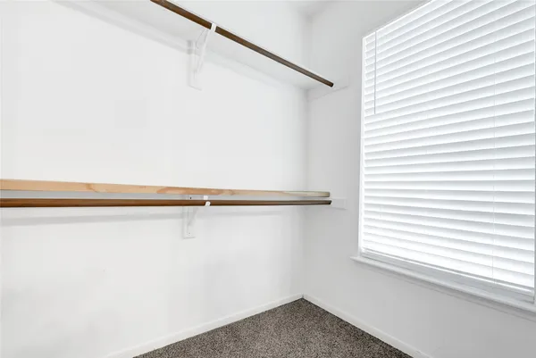 a view of a closet with a window