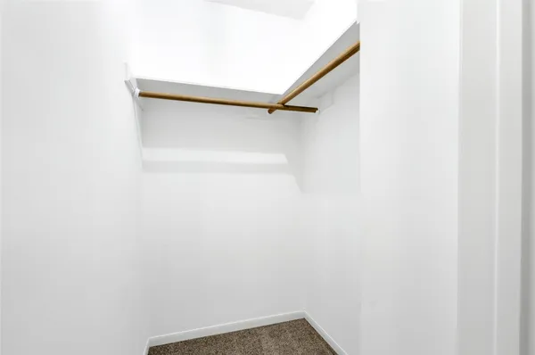 a view of small space with racks on the wall