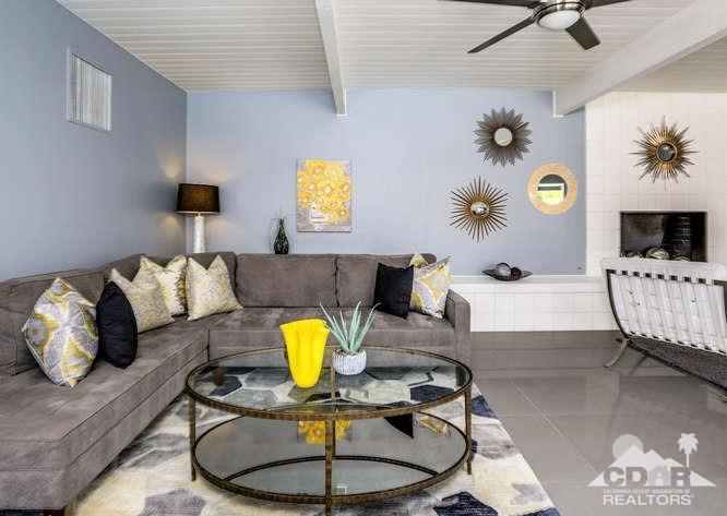 235 North Michelle Road Palm Springs, CA 92262 - Photo 14 of 52 a living room with furniture and a flat screen tv