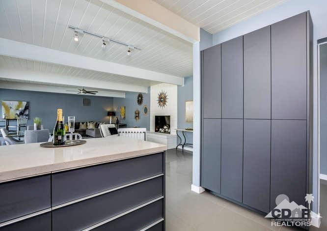 235 North Michelle Road Palm Springs, CA 92262 - Photo 22 of 52 a room with a sink and mirror