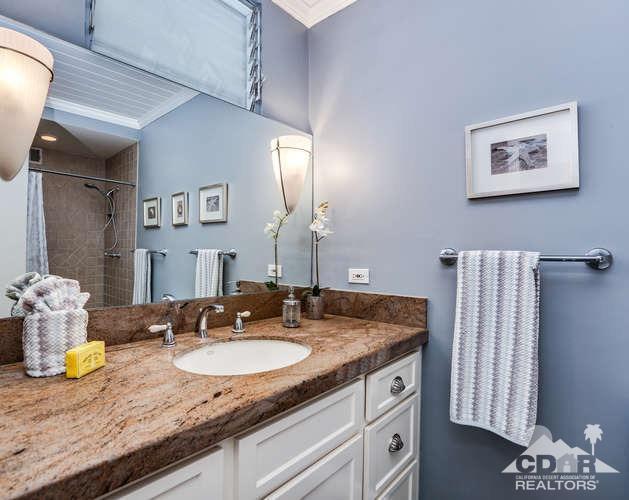 235 North Michelle Road Palm Springs, CA 92262 - Photo 26 of 52 a bathroom with sinks granite countertop and a sink