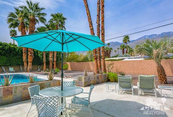 235 North Michelle Road Palm Springs, CA 92262 - Photo 41 of 52 a patio with a table and chairs