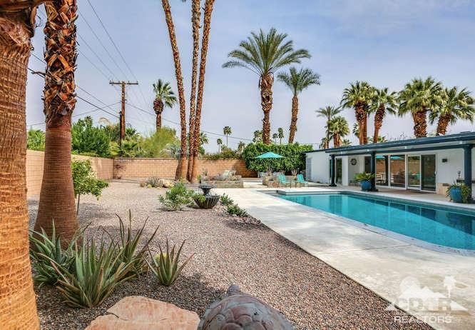 235 North Michelle Road Palm Springs, CA 92262 - Photo 45 of 52 a house with a garden in front of it