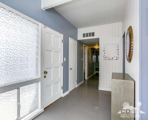 235 North Michelle Road Palm Springs, CA 92262 - Photo 6 of 52 a view of hallway with furniture and a window