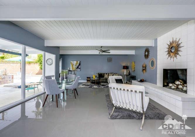 235 North Michelle Road Palm Springs, CA 92262 - Photo 8 of 52 a dining room with furniture a fireplace and a large window
