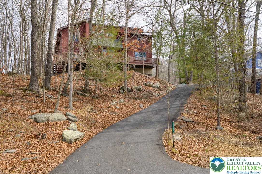 6159 Decker Road Bushkill, PA 18324 - Photo 12 of 49 a pathway of a house with a yard