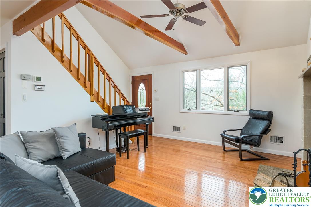6159 Decker Road Bushkill, PA 18324 - Photo 17 of 49 a living room with furniture and a wooden floor