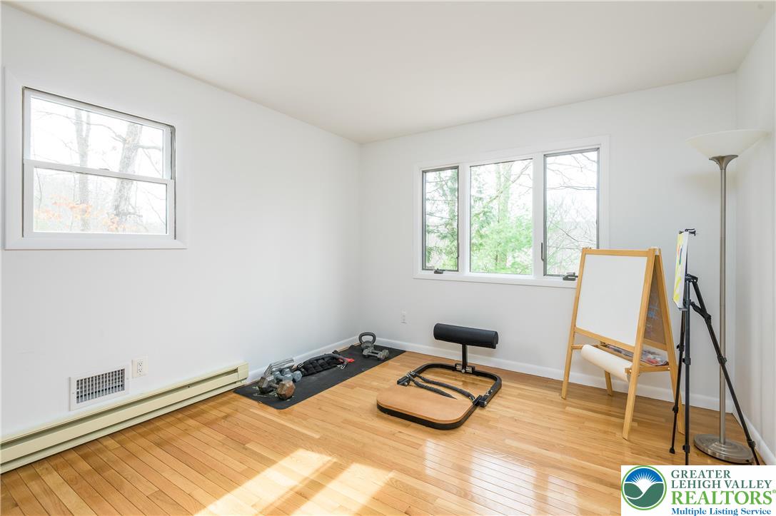6159 Decker Road Bushkill, PA 18324 - Photo 23 of 49 a bedroom with a bed and a window