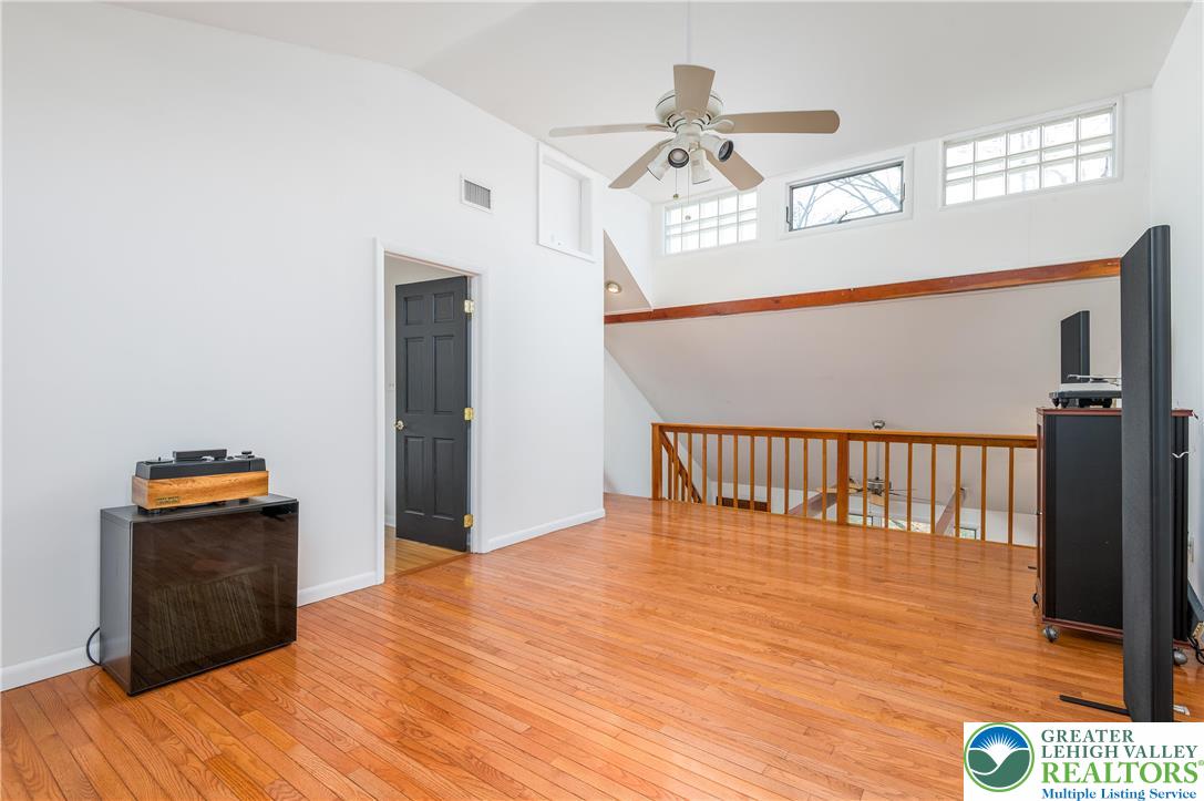 6159 Decker Road Bushkill, PA 18324 - Photo 37 of 49 a view of a hallway with wooden floor and staircase