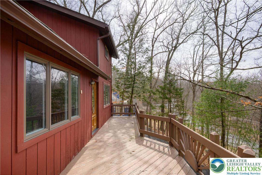 6159 Decker Road Bushkill, PA 18324 - Photo 6 of 49 a view of balcony with wooden floor and fence