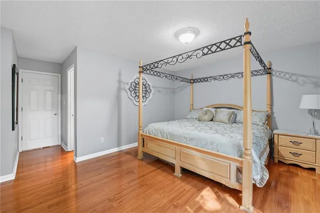 a bathroom with a sink mirror and vanity