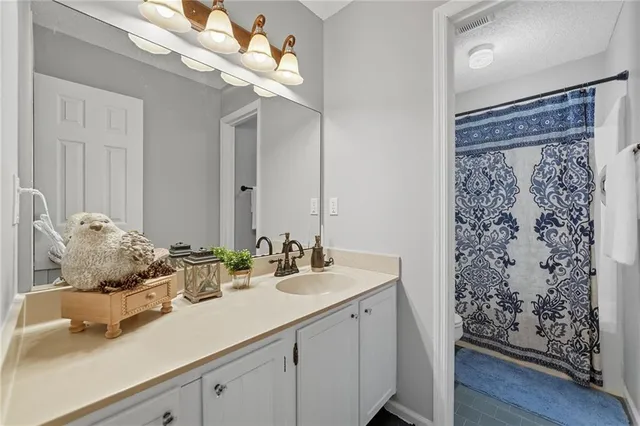 a view of a balcony with wooden floor