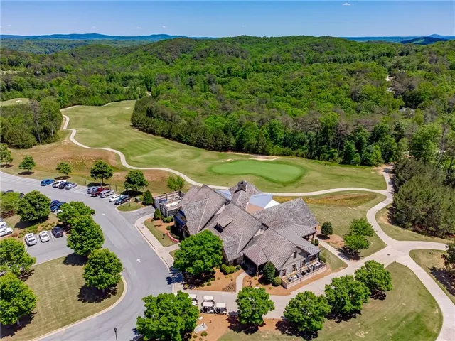 an aerial view of a house an outdoor space