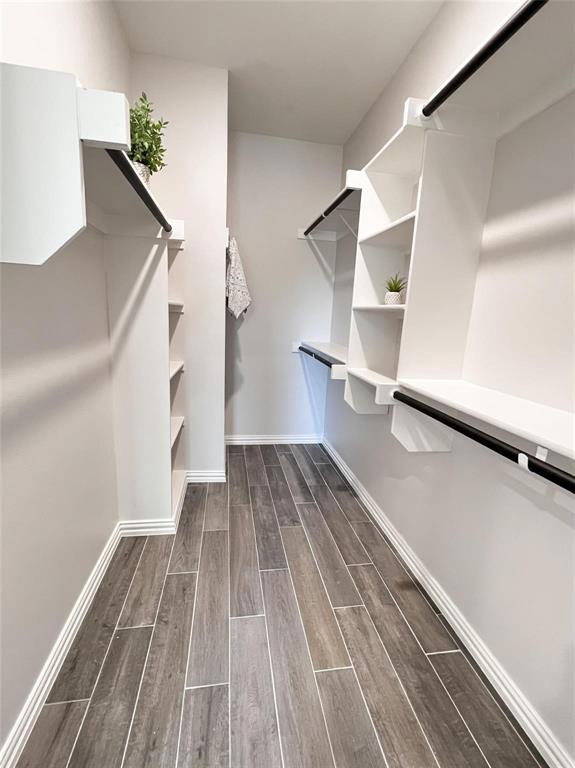 8730 Dunlap Street Dallas, TX 75217 - Photo 11 of 15 a view of entryway and hall with wooden floor