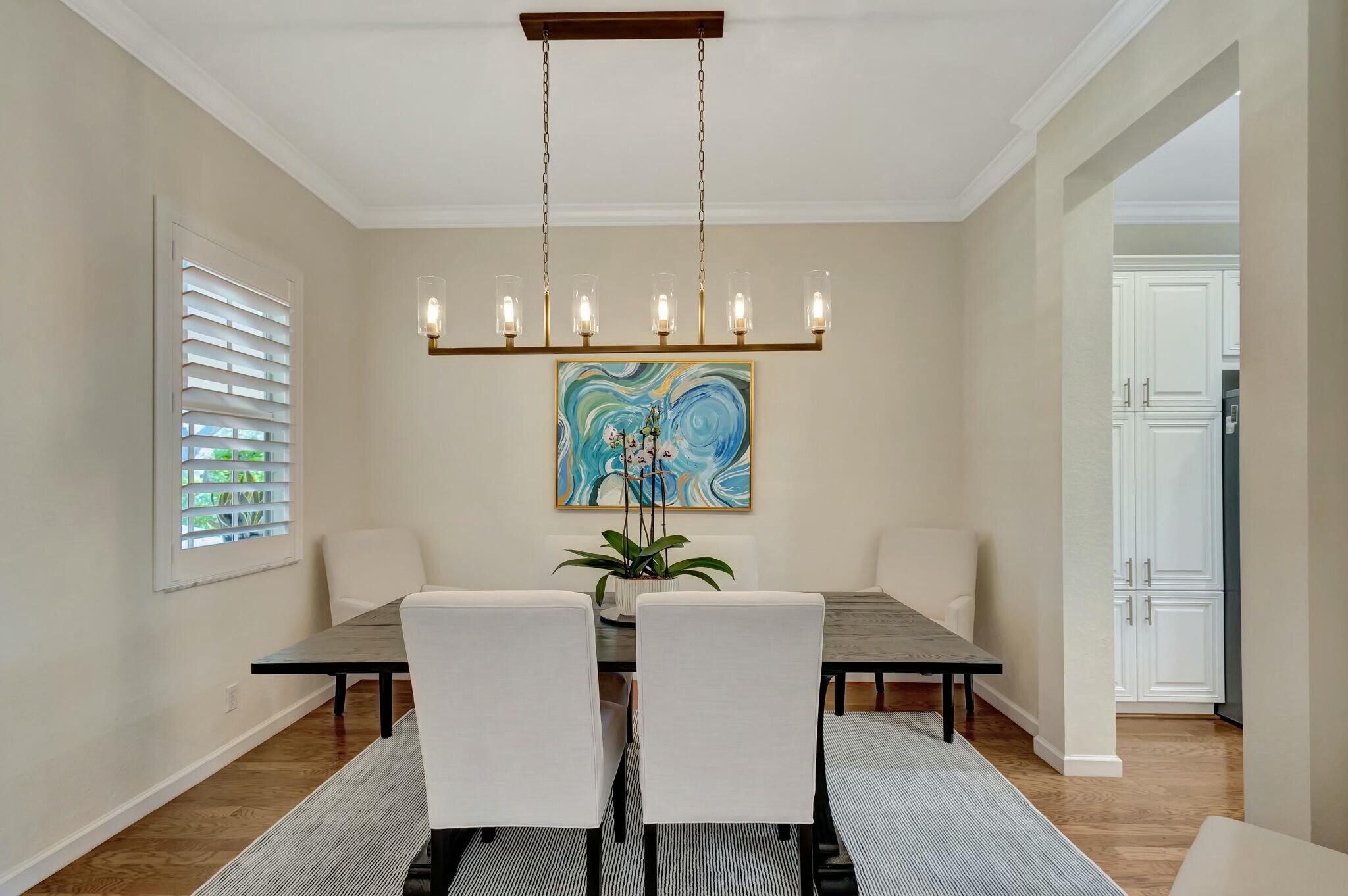 106 Via Santa Cruz Jupiter, FL 33458 - Photo 18 of 71 a dining room with furniture and window