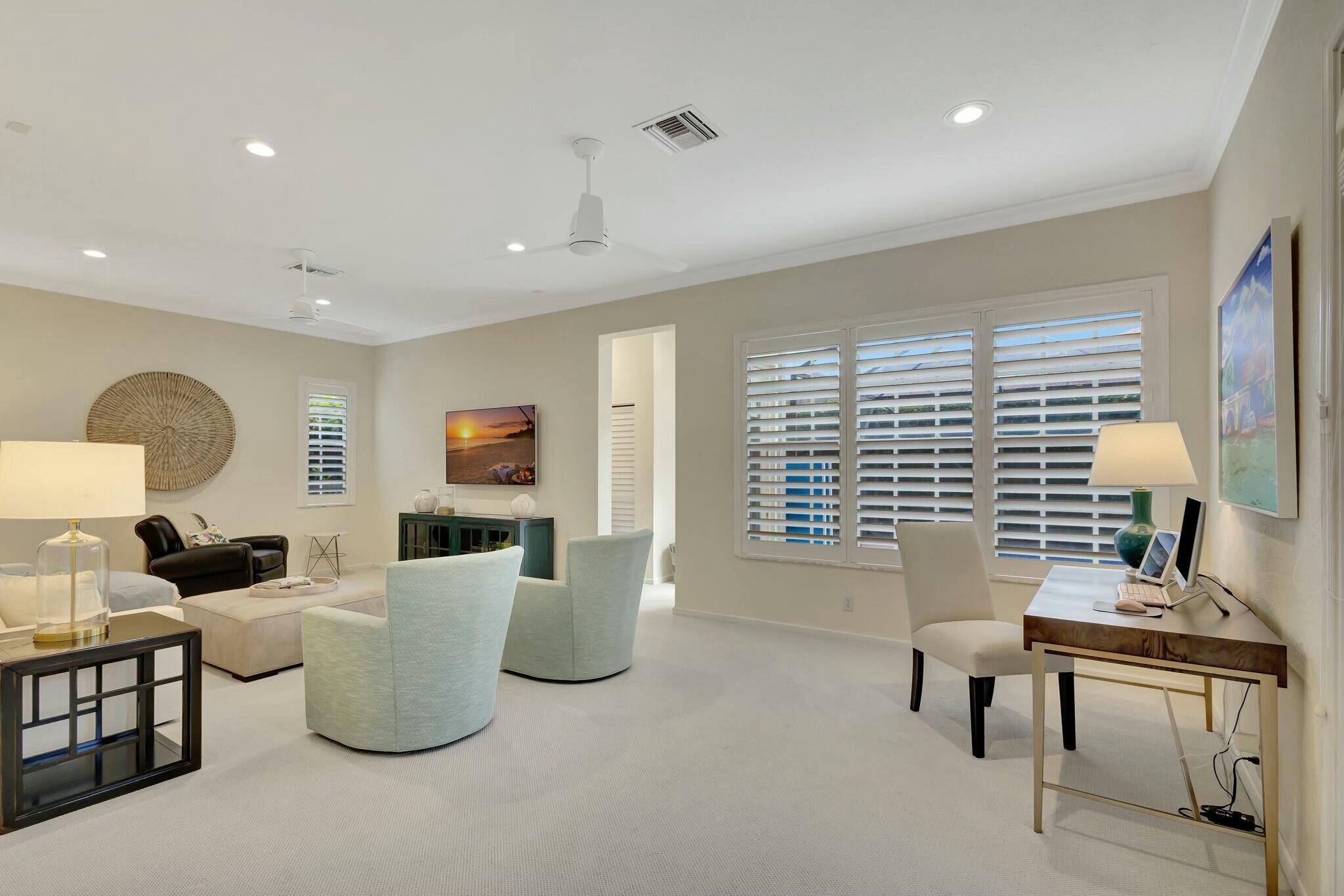 106 Via Santa Cruz Jupiter, FL 33458 - Photo 26 of 71 a living room with furniture and a window
