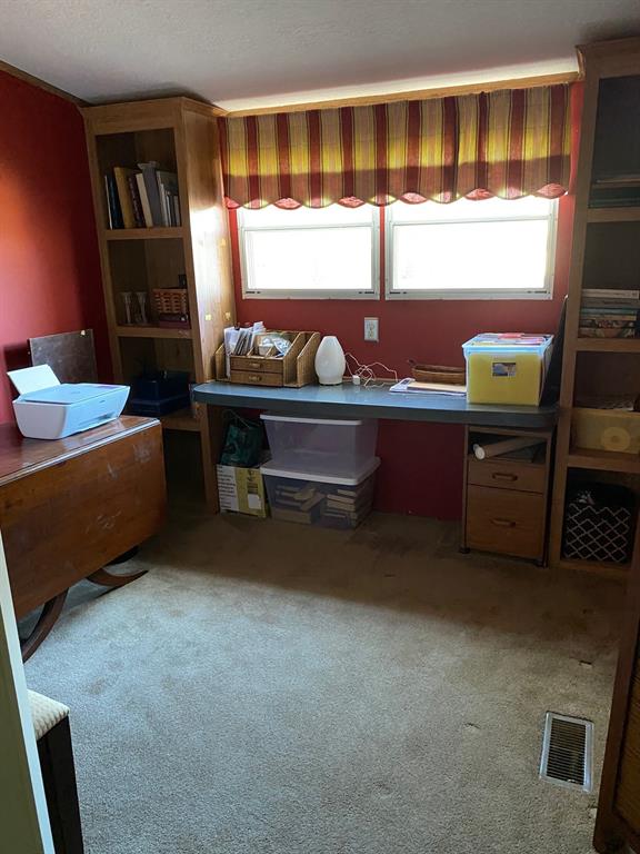 2100 Dove Loop Road, Unit 30 Grapevine, TX 76051 - Photo 17 of 29 a living room with furniture and a window
