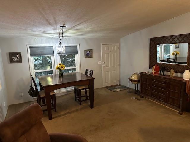 2100 Dove Loop Road, Unit 30 Grapevine, TX 76051 - Photo 21 of 29 a living room with furniture and a chandelier