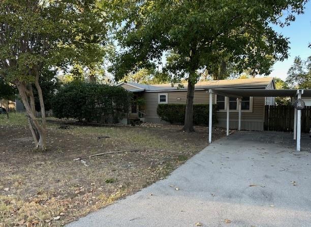 2100 Dove Loop Road, Unit 30 Grapevine, TX 76051 - Photo 3 of 29 a view of a house with a backyard