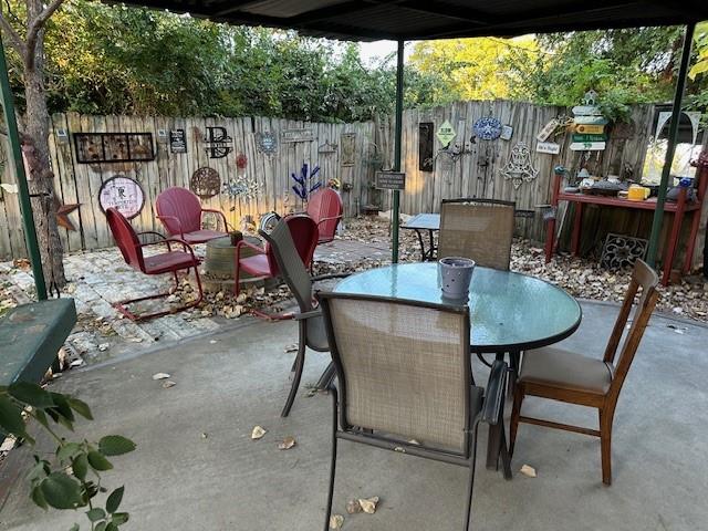 2100 Dove Loop Road, Unit 30 Grapevine, TX 76051 - Photo 8 of 29 a outdoor dining space with furniture and outdoor view