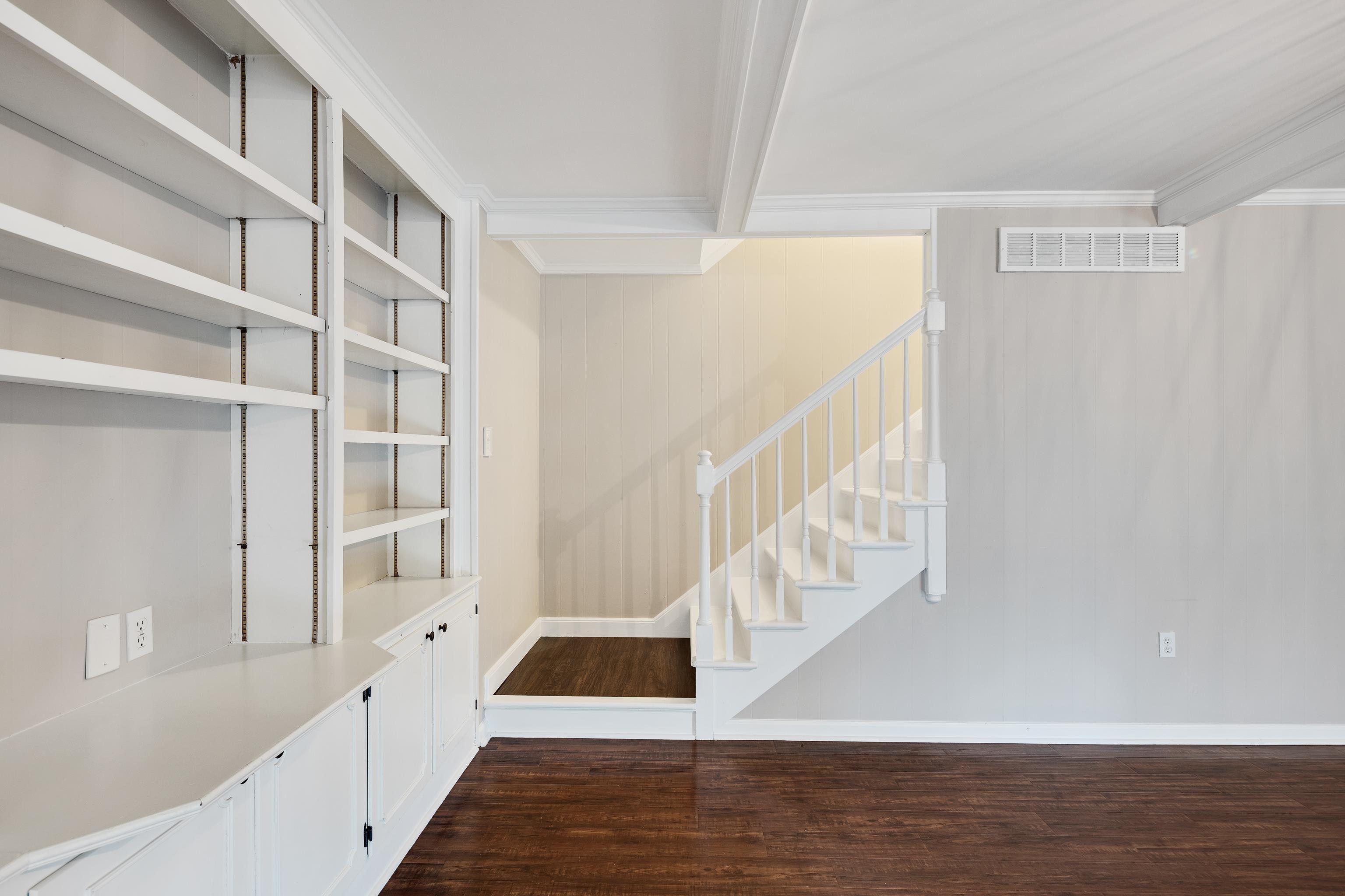 1658 Miller Farms Road Germantown, TN 38138 - Photo 26 of 39 Staircase with wood finished floors, ornamental molding, and beamed ceiling