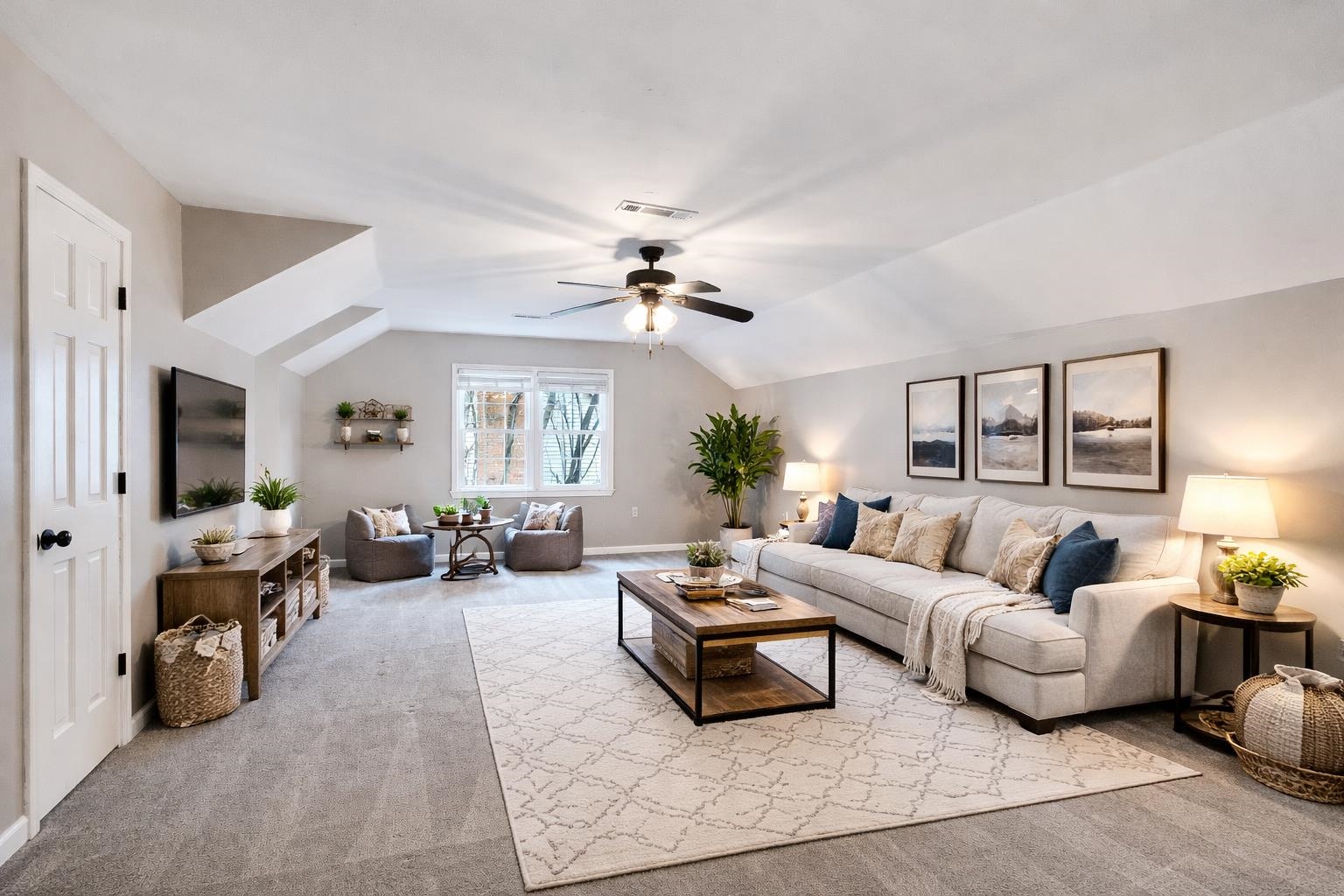 1658 Miller Farms Road Germantown, TN 38138 - Photo 31 of 39 Carpeted living area with lofted ceiling and ceiling fan
