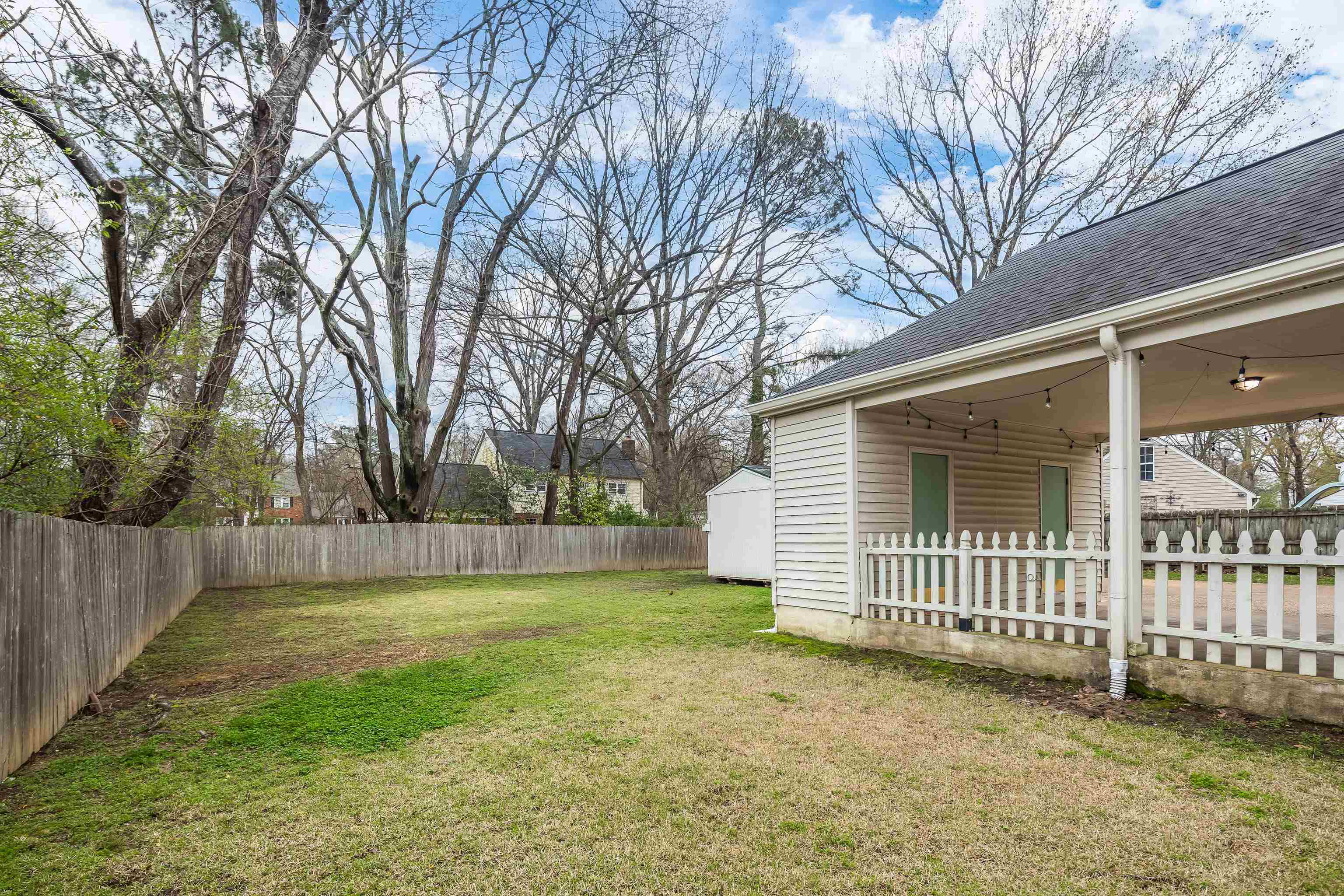 1658 Miller Farms Road Germantown, TN 38138 - Photo 37 of 39 Fenced backyard featuring a patio and a shed