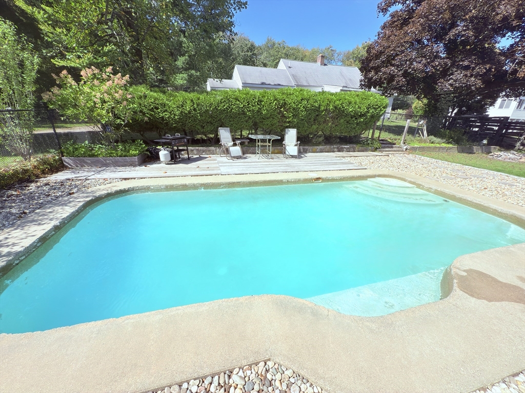 975 South Main Street Bellingham, MA 02019 - Photo 31 of 38 a view of a swimming pool with a patio