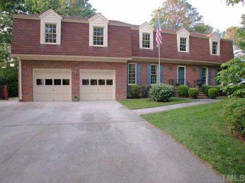 1824 Lodestar Drive Raleigh, NC 27615 - Photo 1 of 1 a front view of a house with garden