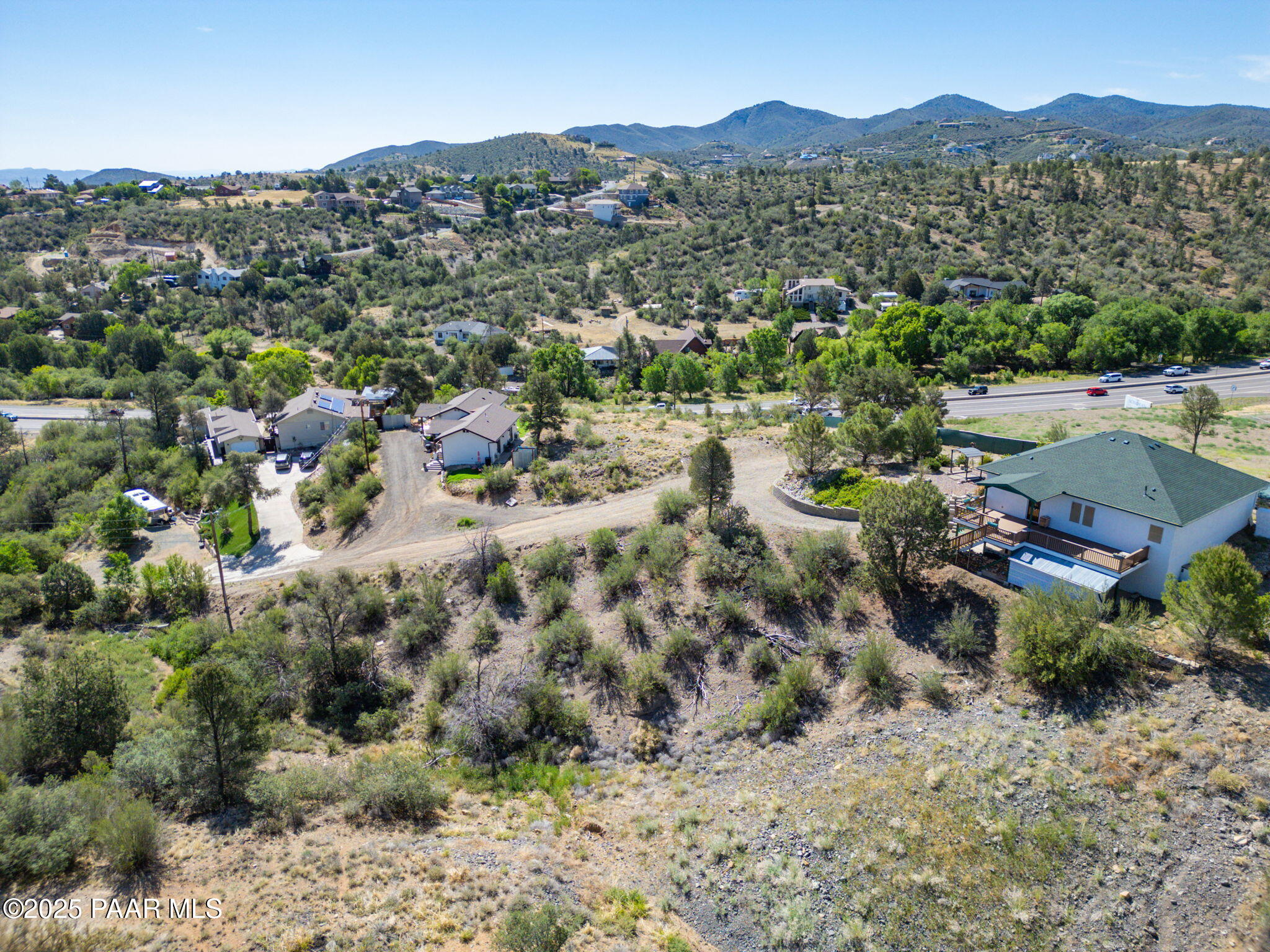 1128 Rhinestone Drive Prescott, AZ 86301 - Photo 6 of 11 a view of a city with mountains in the background