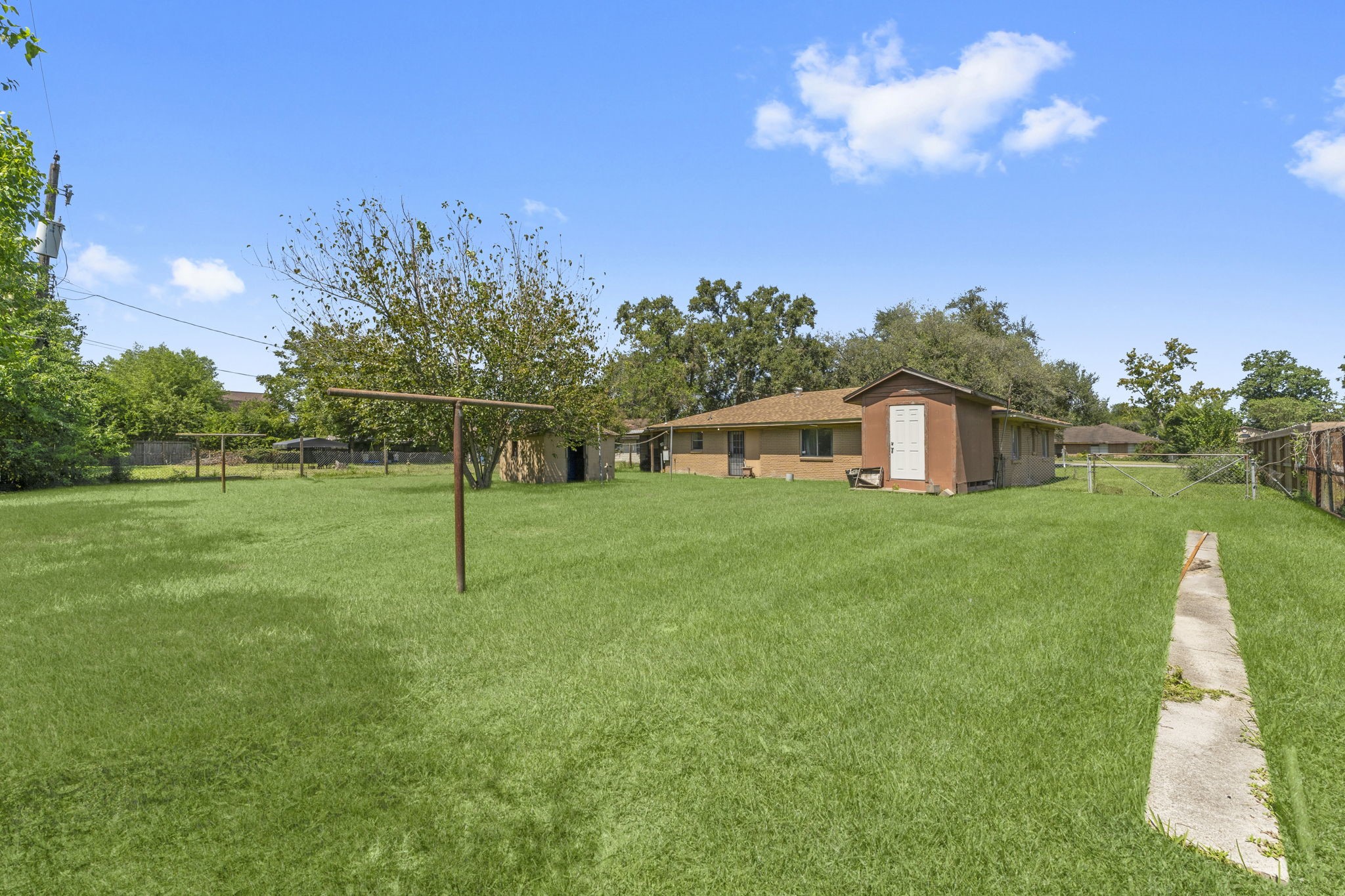 814 Isetta Lane Houston, TX 77060 - Photo 27 of 30 a house view with a play ground in front of it