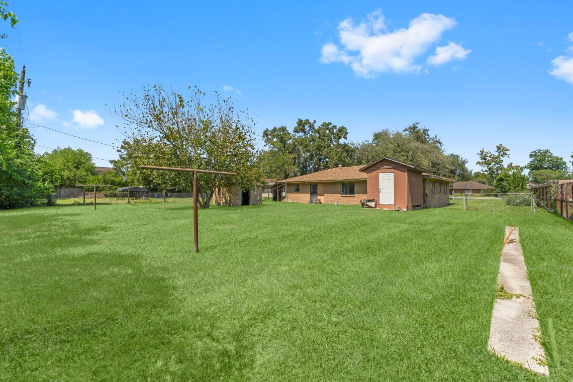 814 Isetta Lane Houston, TX 77060 - Photo 27 of 30 a house view with a play ground in front of it