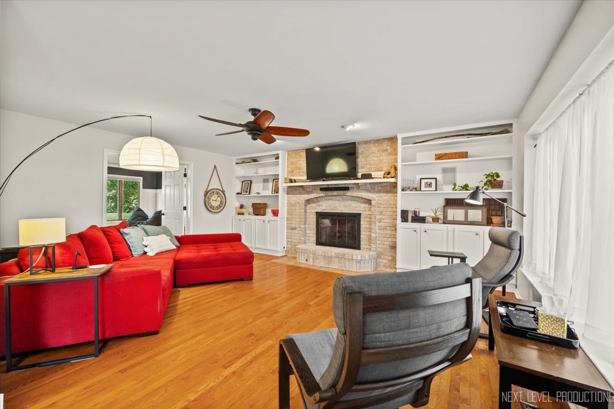 92 Red Fox Run Montgomery, IL 60538 - Photo 11 of 25 a living room with furniture fireplace and flat screen tv