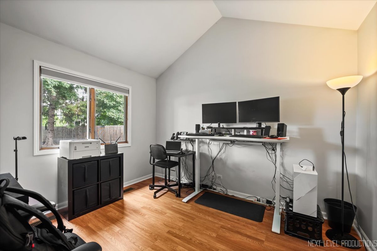 92 Red Fox Run Montgomery, IL 60538 - Photo 13 of 25 a view of a workspace with furniture and a window